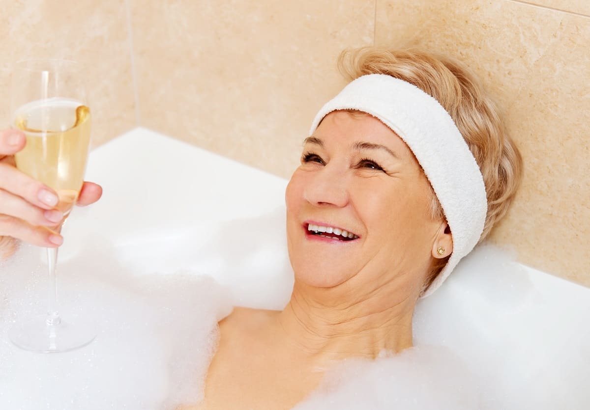 Senior Woman Relaxing in Bathtub