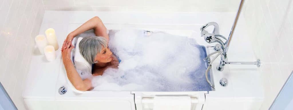 Woman relaxing in the Safe Step Walk-In Tub