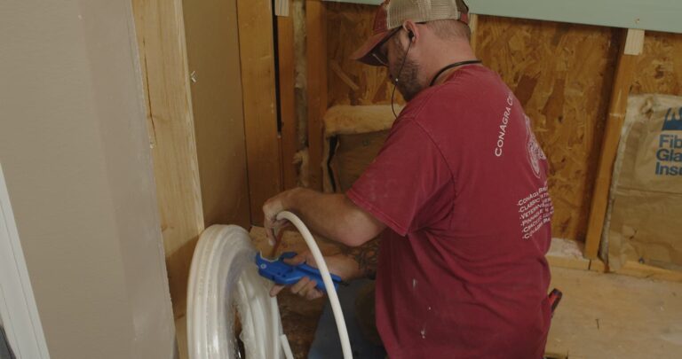 Installer with plumbing lines
