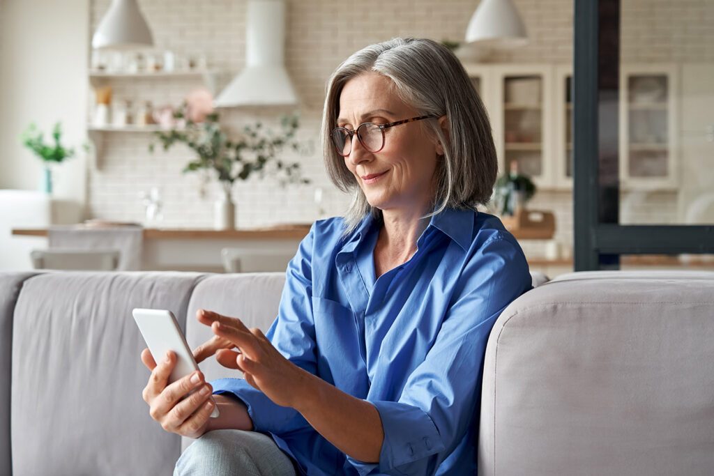 Senior woman with a phone