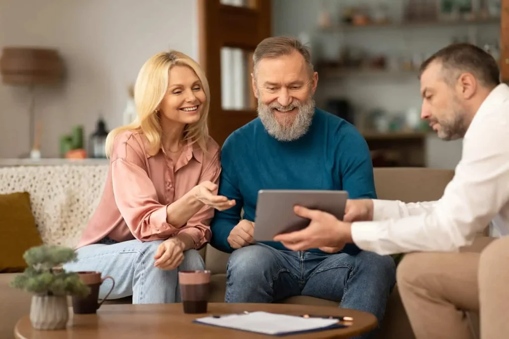 couple discussing stairlift options with a Safe Step representative