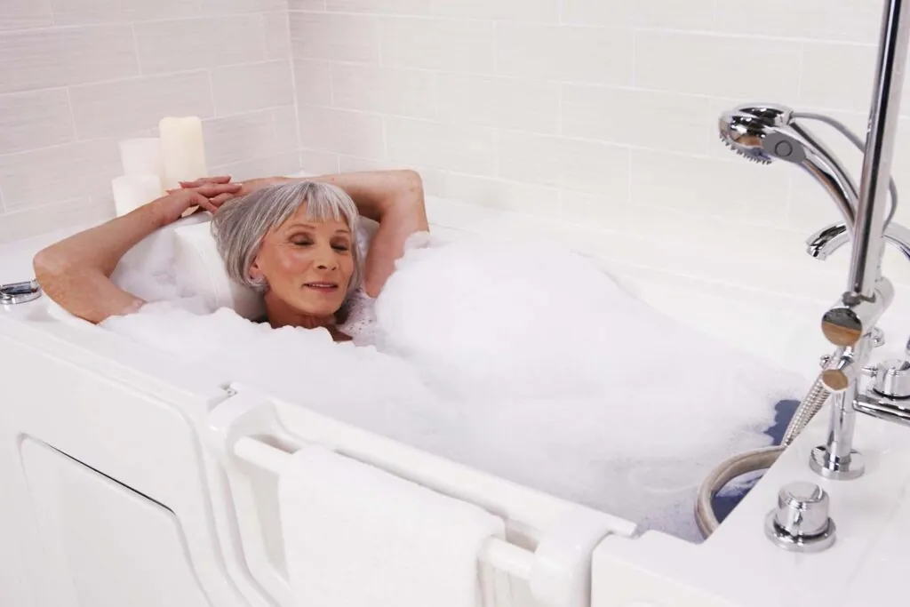 woman relaxing in walk-in tub with bubbles